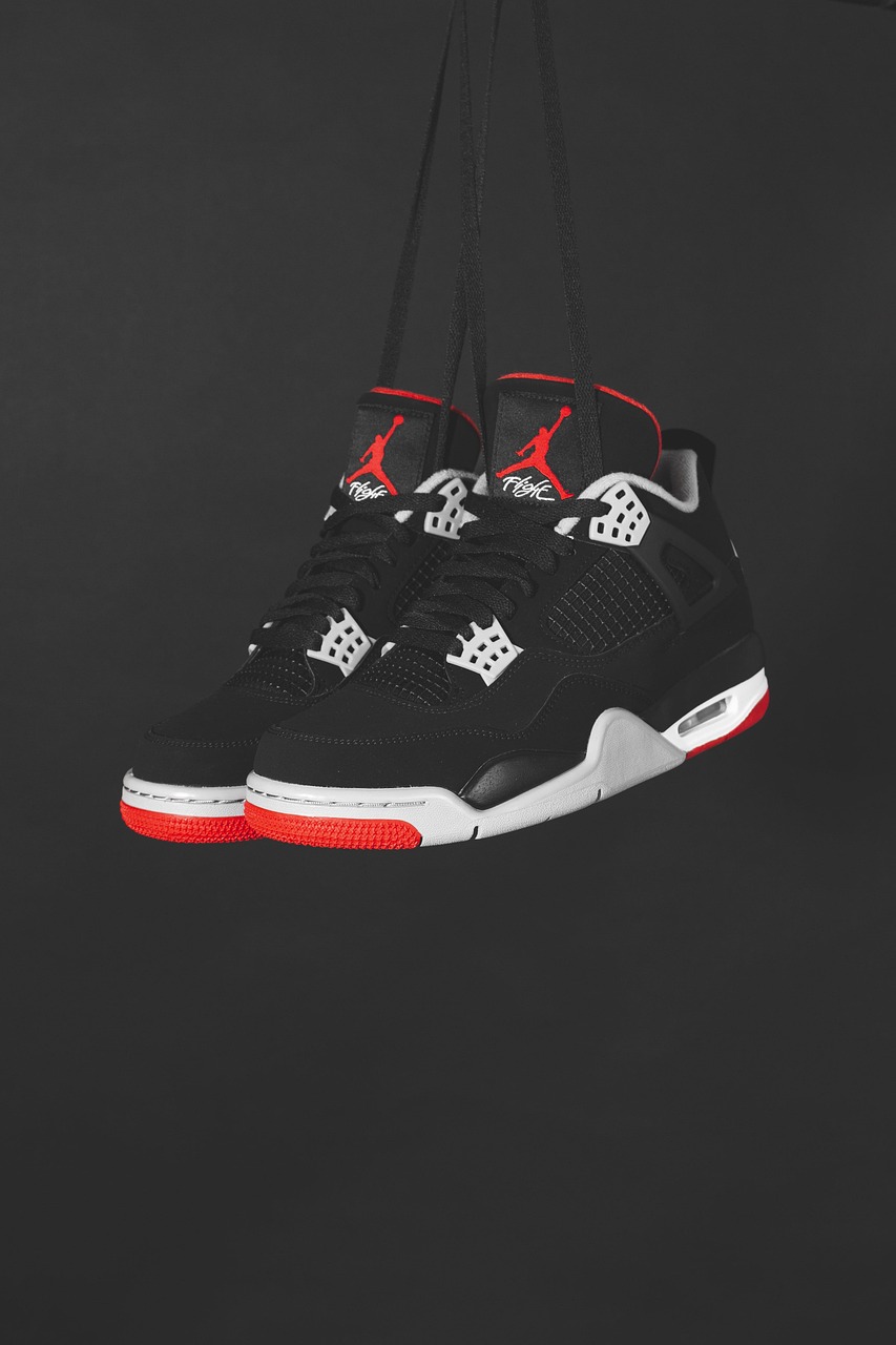 A pair of high-top basketball trainers